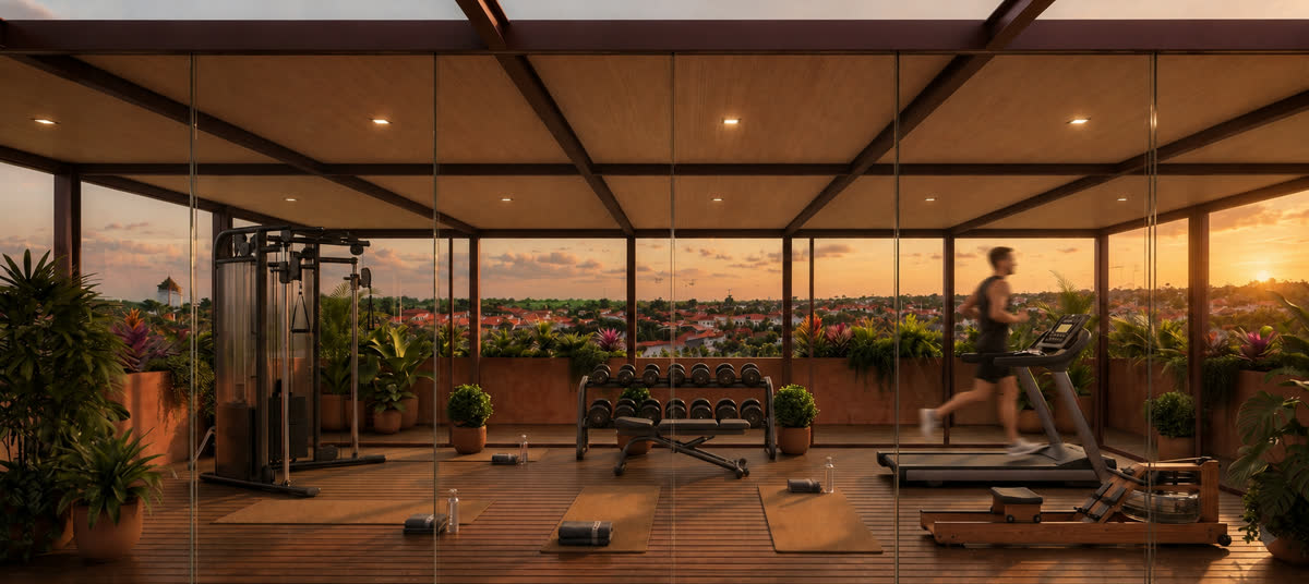 The rooftop gym, open to the Canggu skyline at sunset