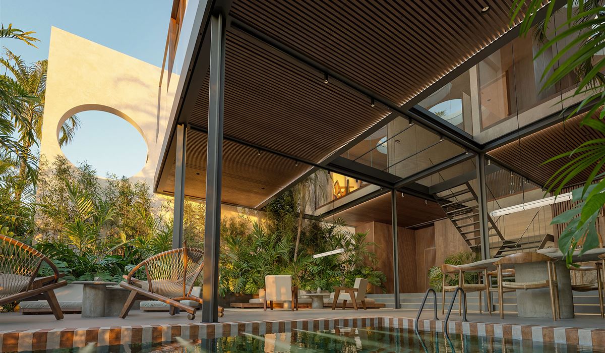 The pool pavilion under the louvred canopy